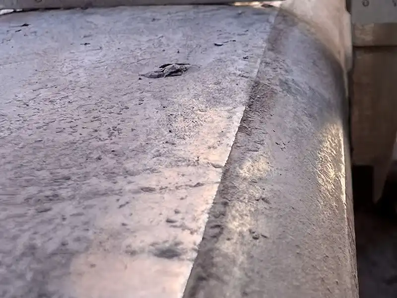 A closer view of deposits on the rail running surface
