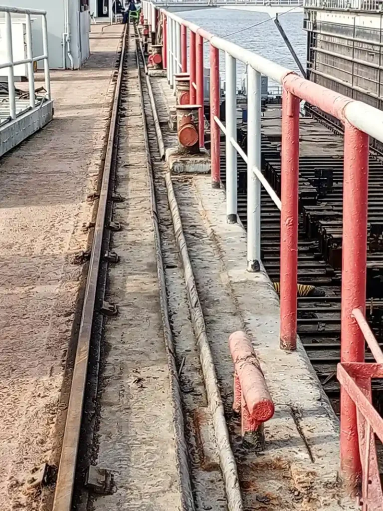 Original A45 rail surface with heavy pitting and coating loss