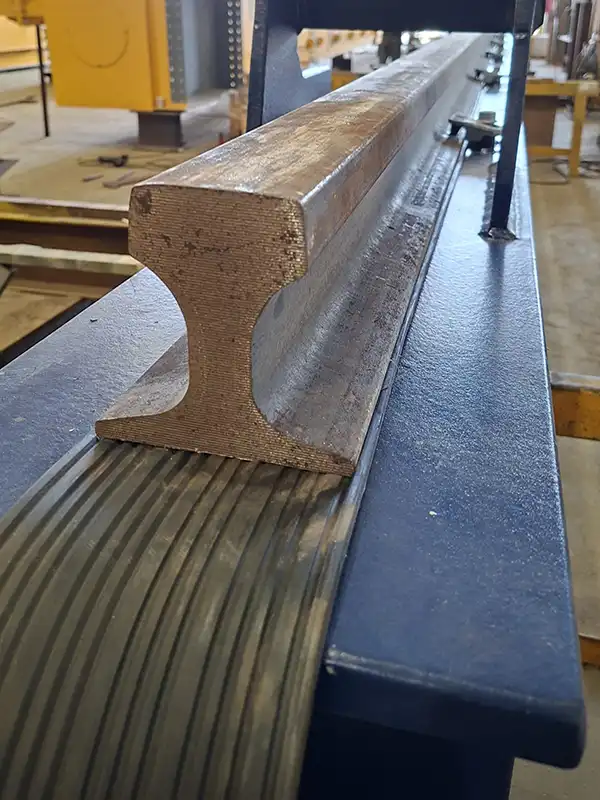 QU70 Crane Rail Cross-Section on Rubber Pad